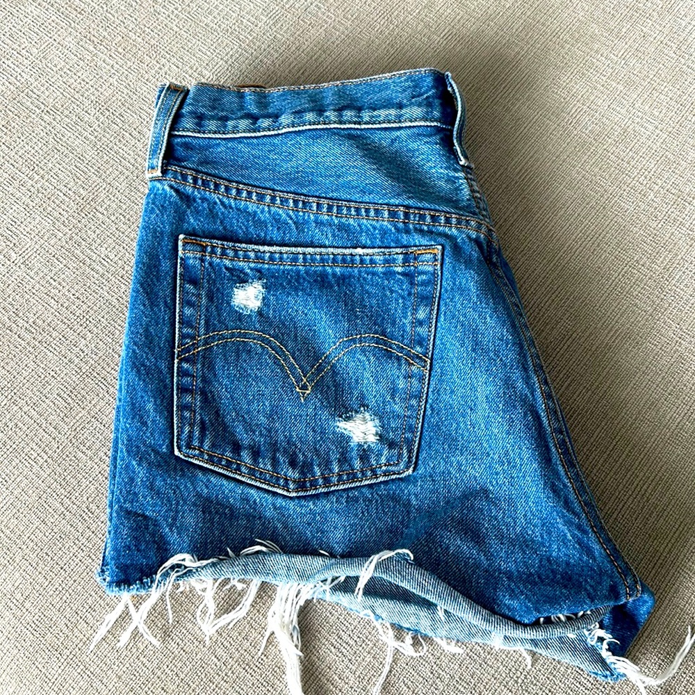 levi jean shorts, button fly, size 29 raw edge hem